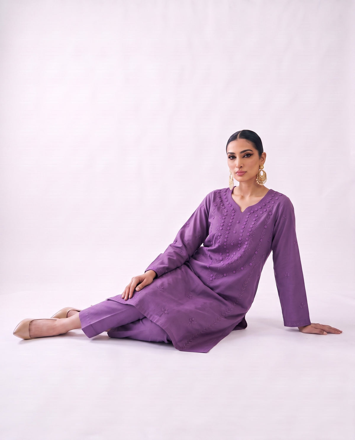 Amethyst embroidered kurta set, reclining pose