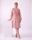 Blush pink embroidered kurta set, standing pose