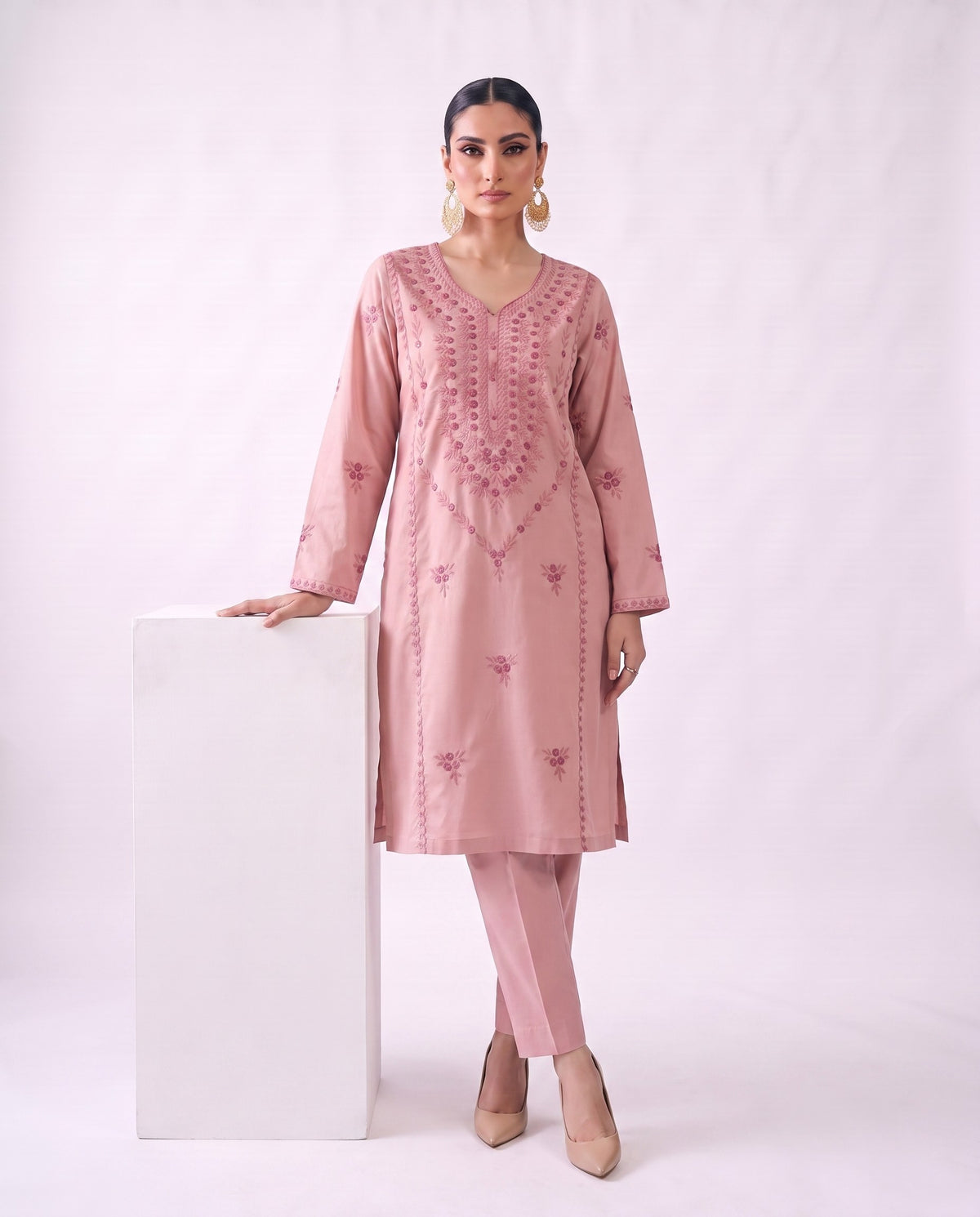 Blush pink embroidered kurta set, standing pose