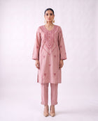 Blush pink embroidered kurta set, standing modern pose