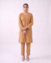 Camel gold embroidered kurta set, standing modern pose