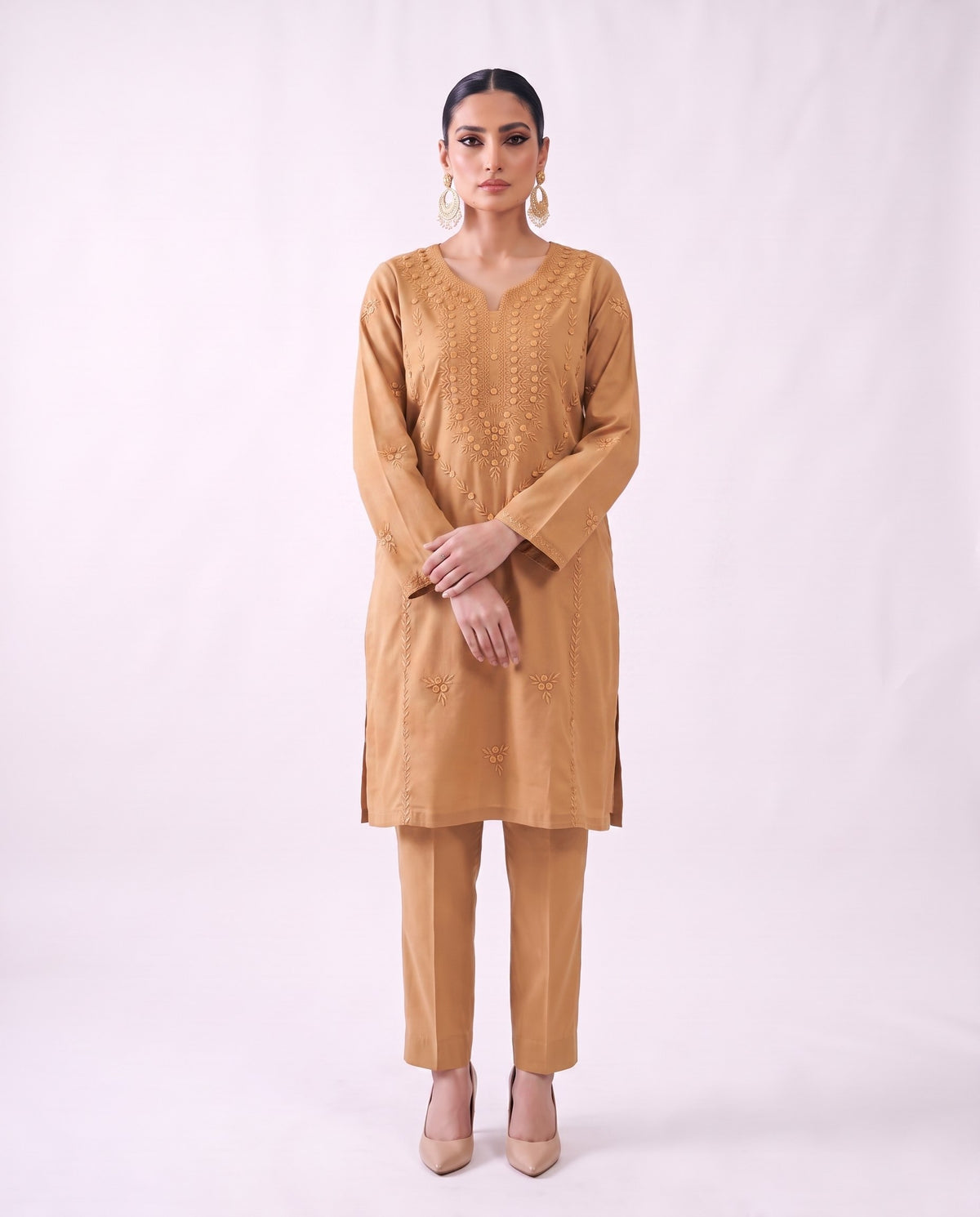 Camel gold embroidered kurta set, standing modern pose