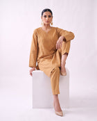Camel gold embroidered kurta set, seated pose