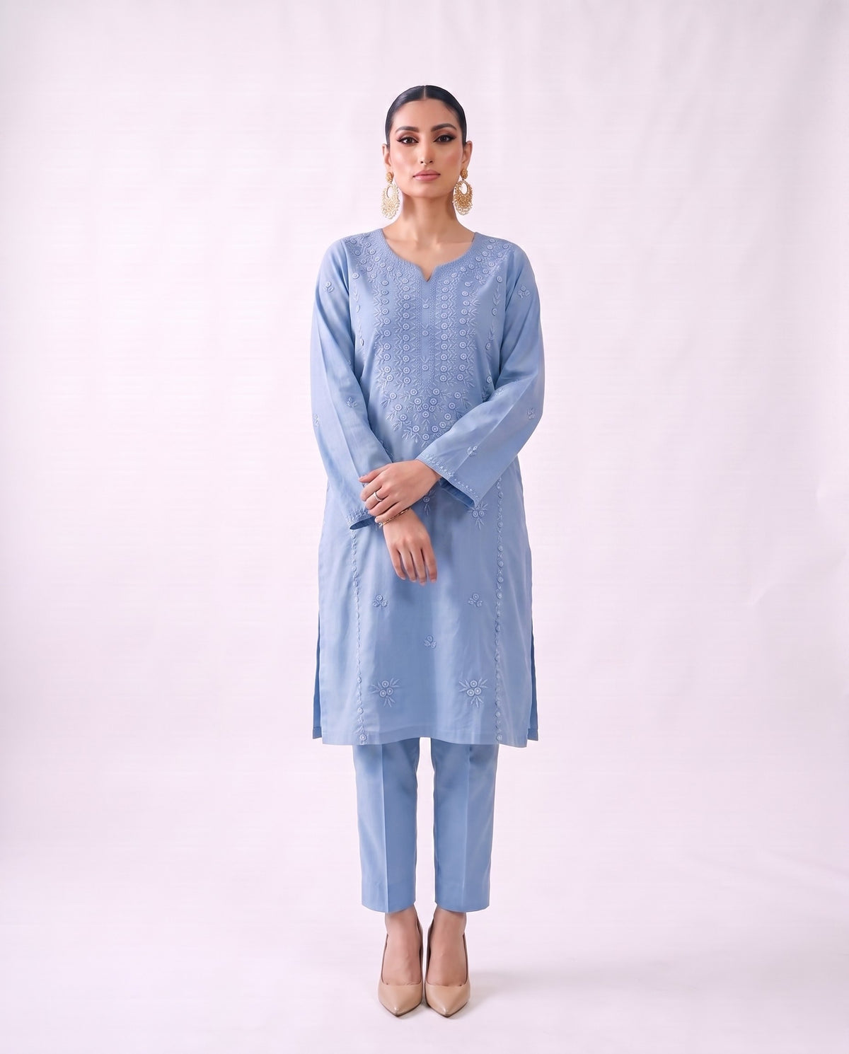 Cornflower blue embroidered kurta set, standing modern pose