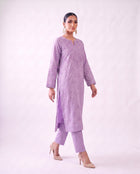 Lavender embroidered kurta set, standing pose
