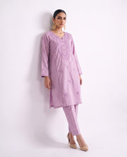 Lavender embroidered kurta set, standing modern pose