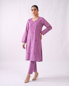 Orchid embroidered kurta set, hand on hip pose