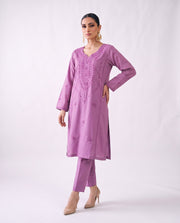 Orchid embroidered kurta set, hand on hip pose