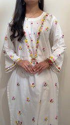 White kurta multicolour embroidery close-up