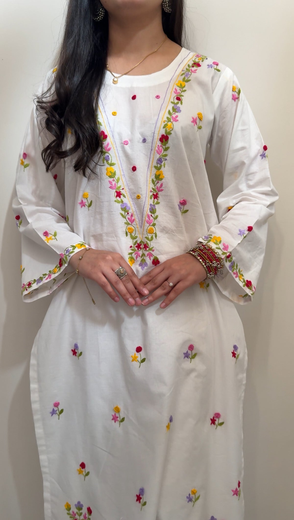 White kurta multicolour embroidery close-up
