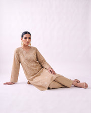 Sand beige embroidered kurta set, reclining pose
