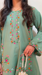 Sage green kurta, real embroidery close-up