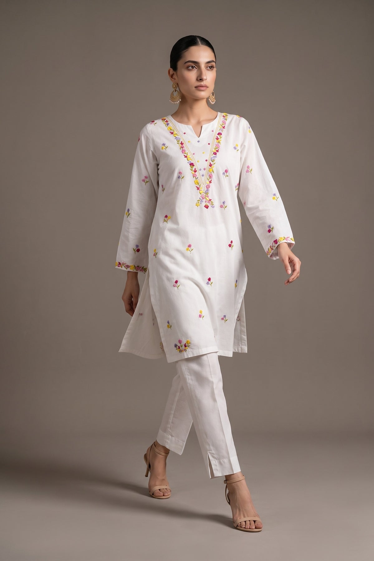 White multicolour embroidered kurta, walking